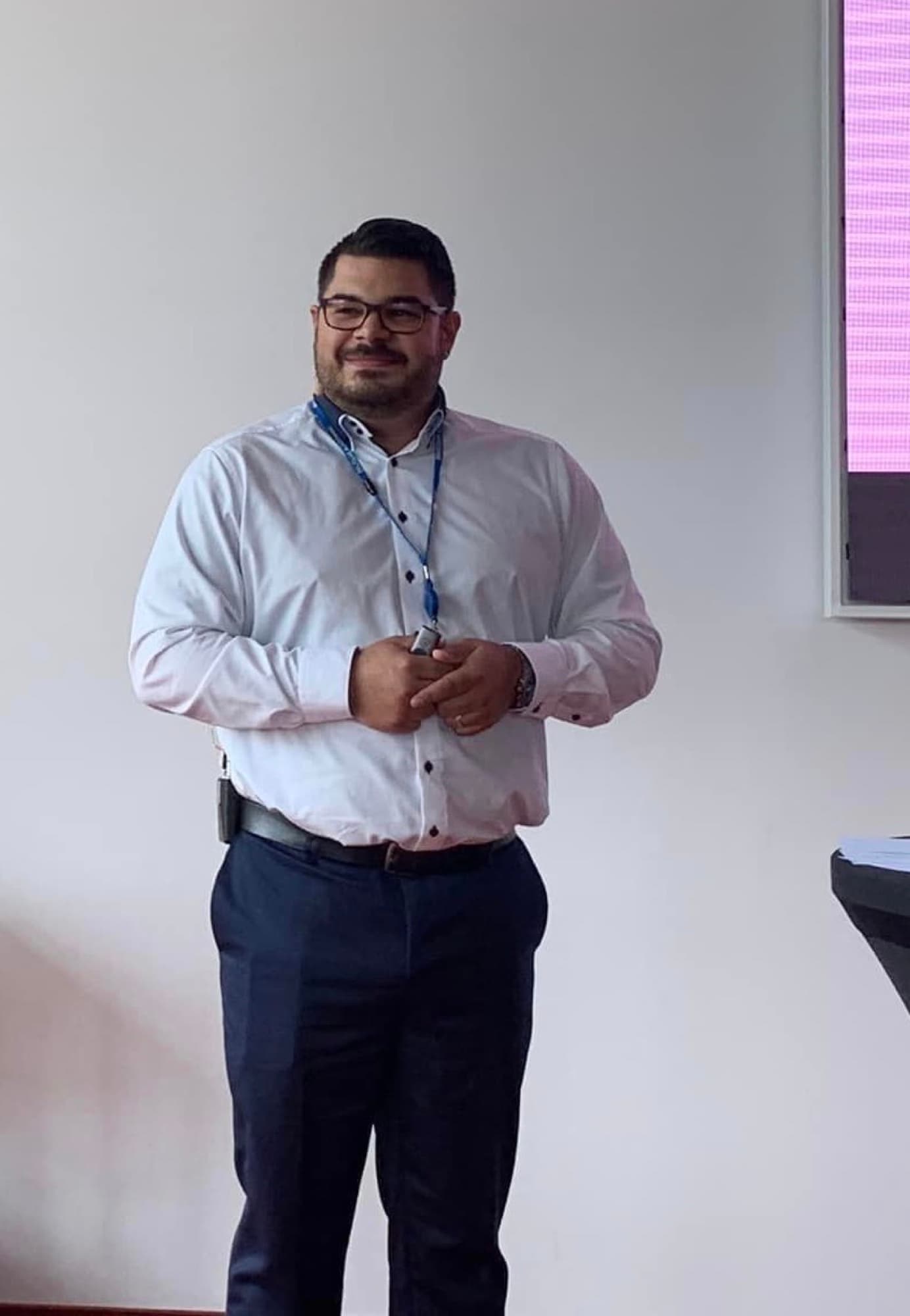 Christian de Coster presenting at a speaking engagement